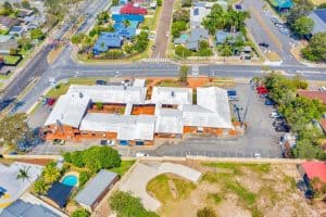 1/1-9 Lindfield Road, Helensvale QLD 4212 - Rooftop Building, Vicinity and Parking Lot View 2