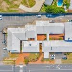 1/1-9 Lindfield Road, Helensvale QLD 4212 - Rooftop Building, Vicinity and Parking Lot View